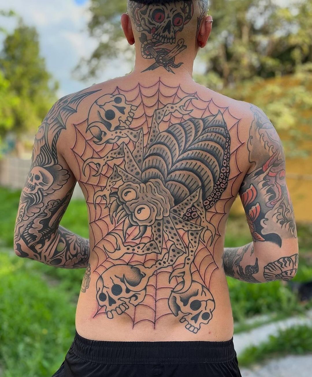 traditional full back tattoo by mental void