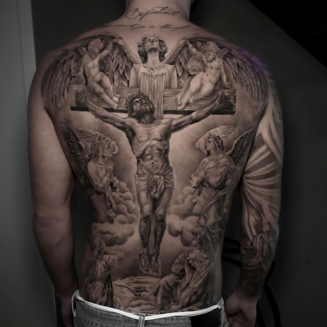 black & grey realism full back tattoo by florian thomys