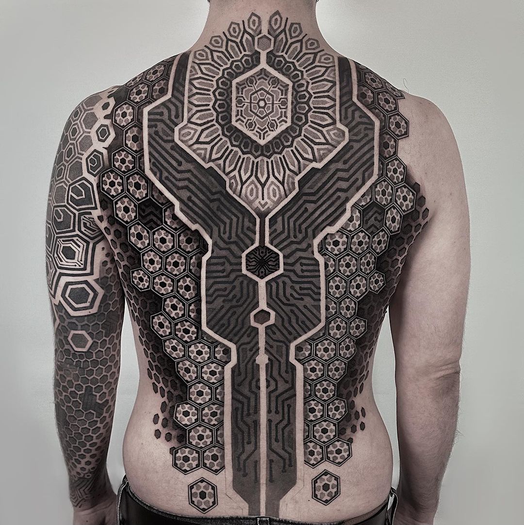 geometric full back tattoo by blanca meret