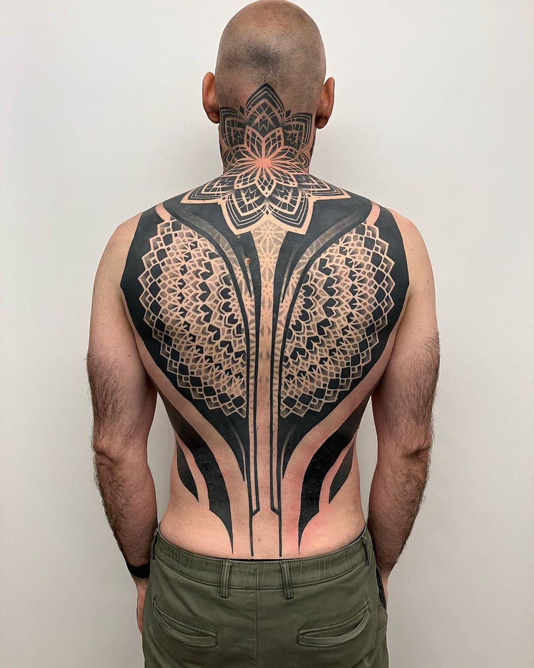 mandala full back tattoo by tom pouce