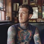 mark zuckerberg imagined with tattooes via midjourney