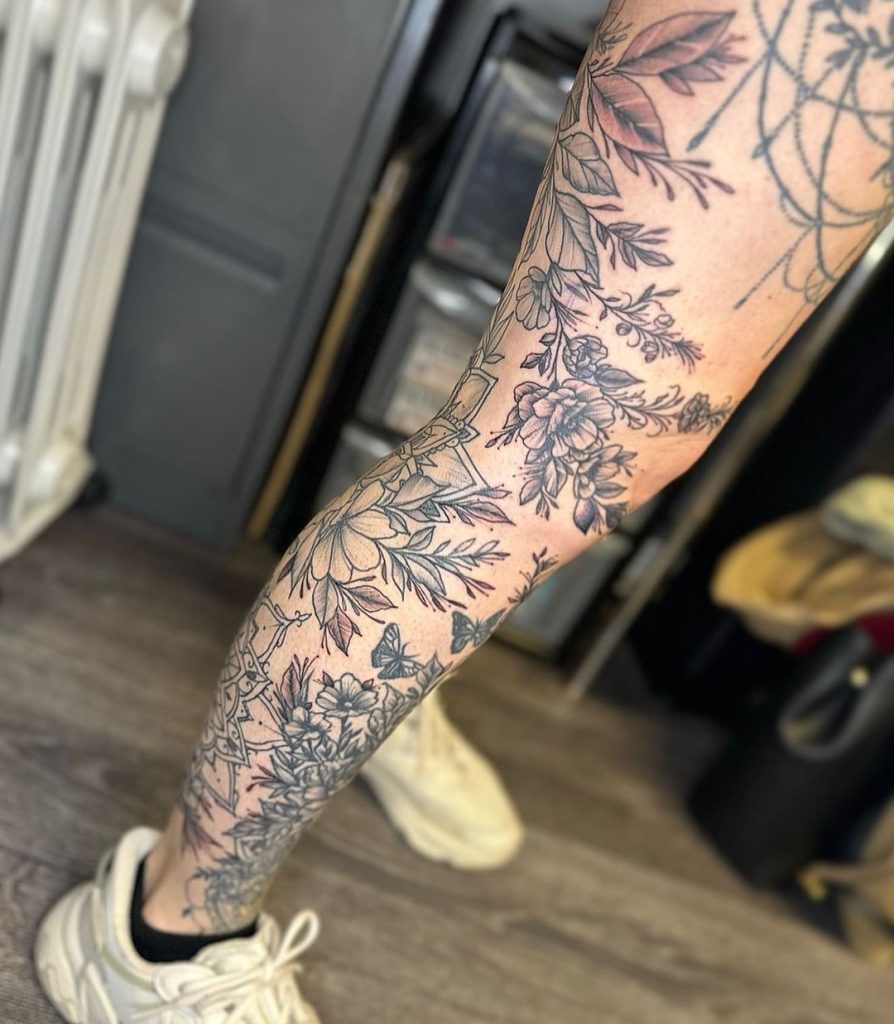 Floral Negative Space Leg Sleeve Tattoo by Mandala Tattoo