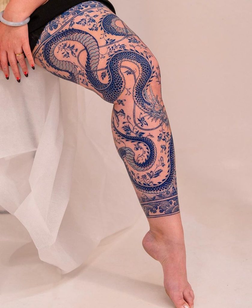 Negative Space Ornamental Oriental Dragon Leg Sleeve Tattoo by Oozy