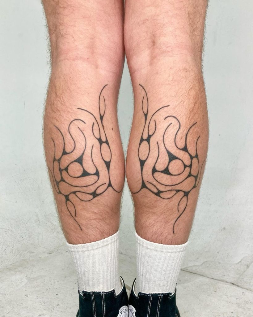 Double Abstract Calf Tattoos by Restraint Release