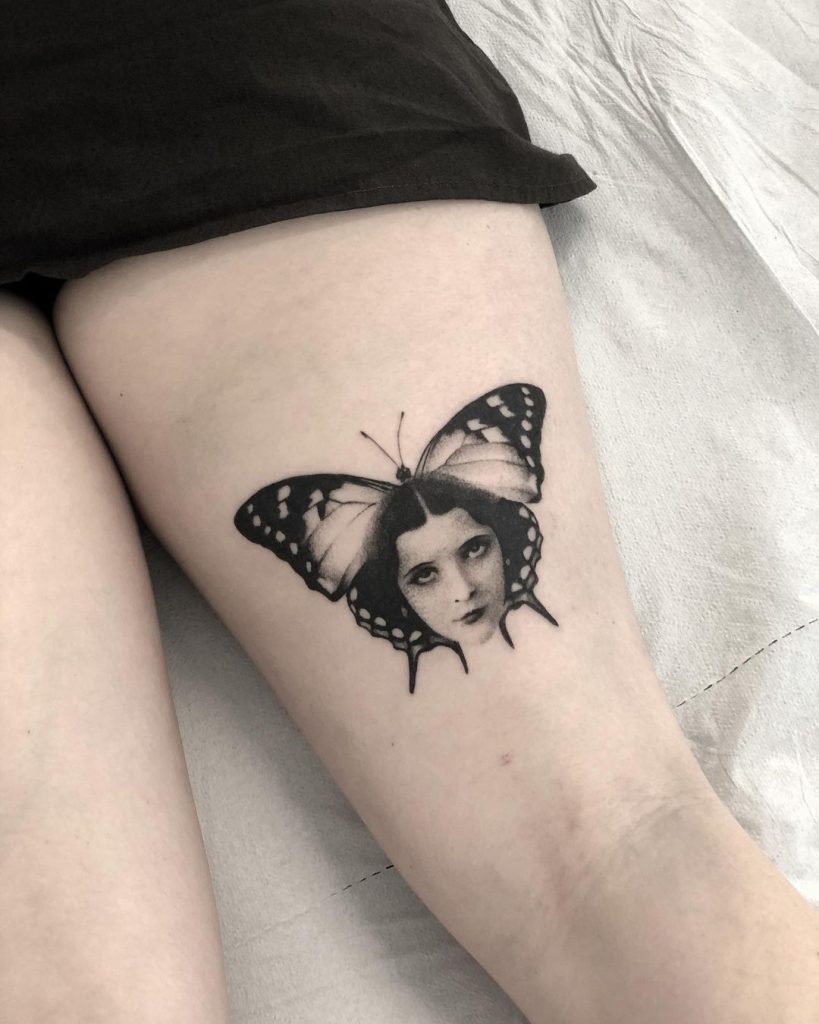 Black and Grey Back Thigh Butterfly Portrait Tattoo by Jerome
