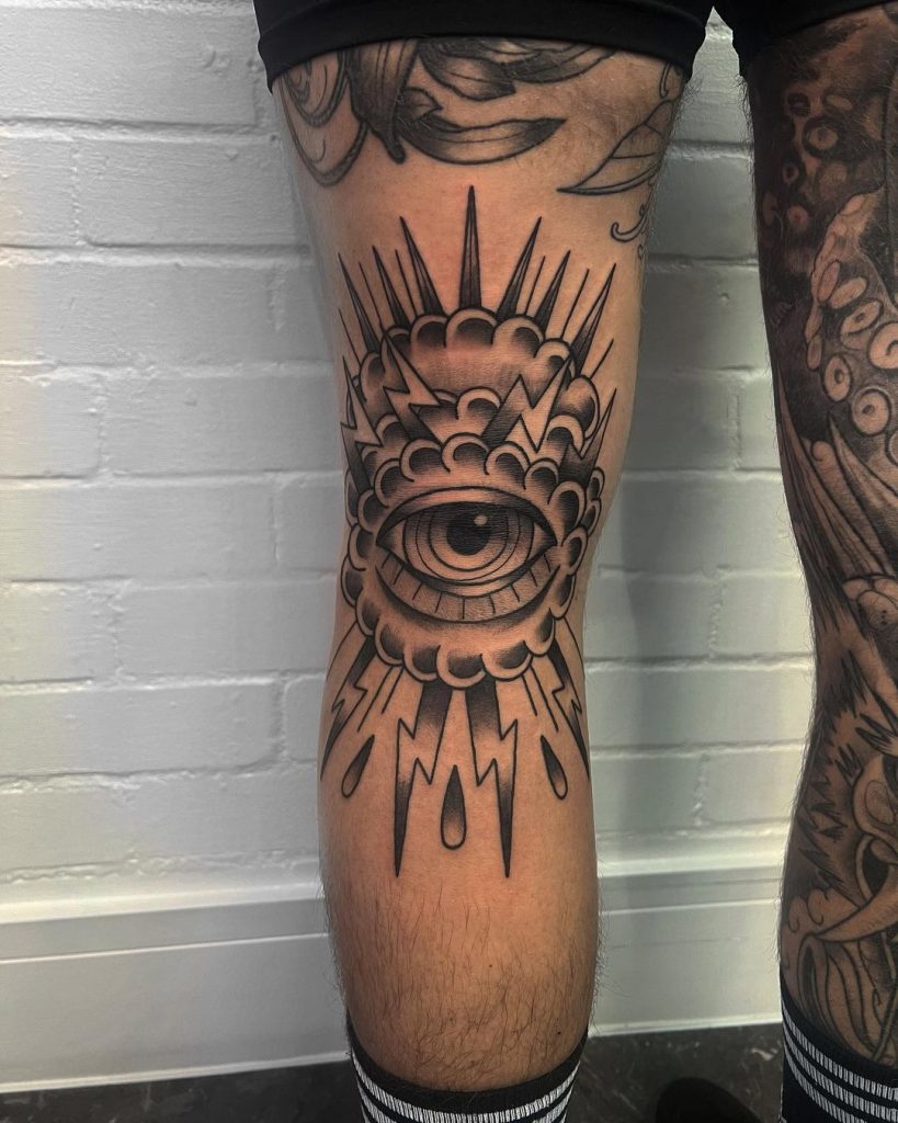 Old School Traditional Storm Eye With Lightnings Knee Tattoo by Tina Lewis
