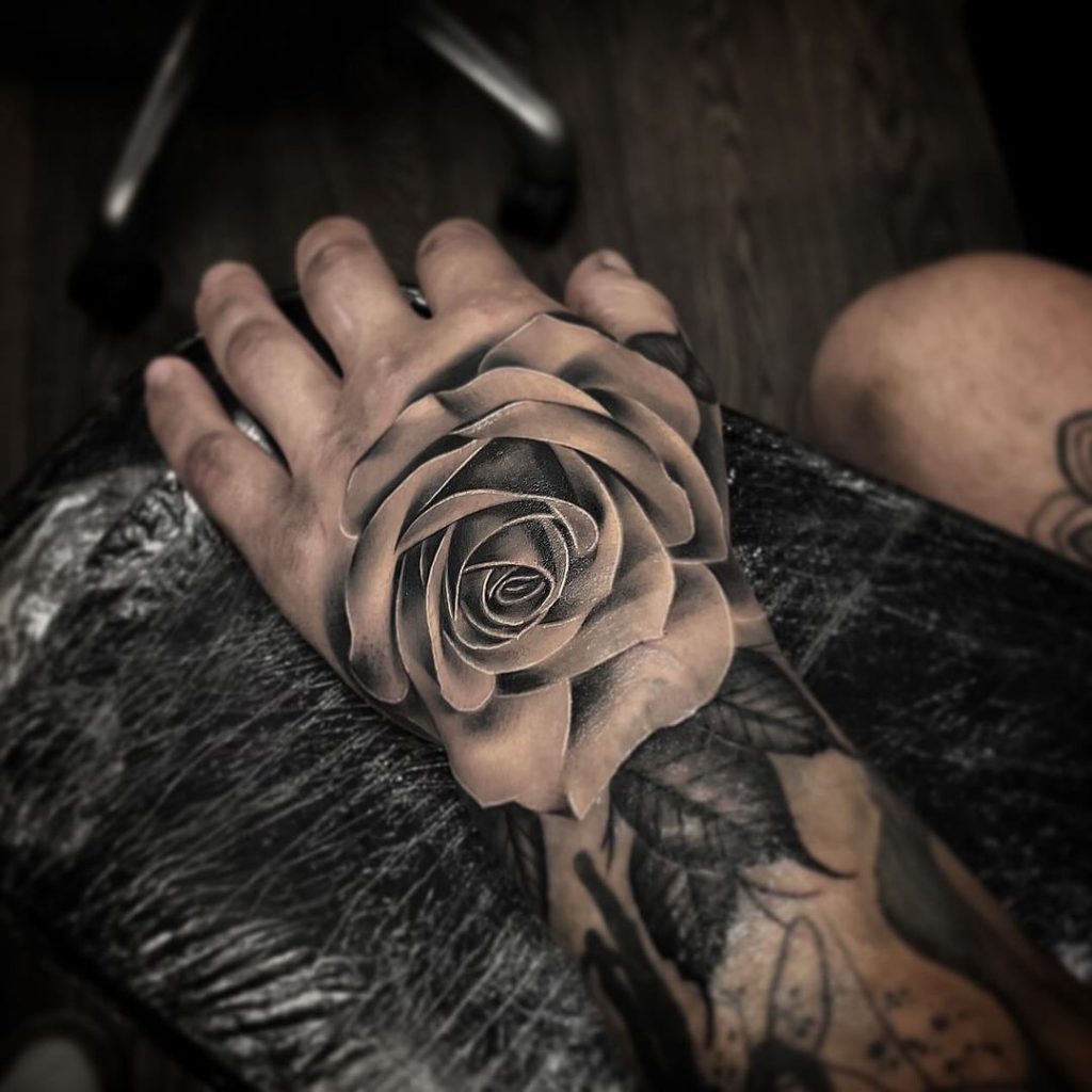 Black and Grey Realistic Rose Hand Tattoo by Aron Cowles
