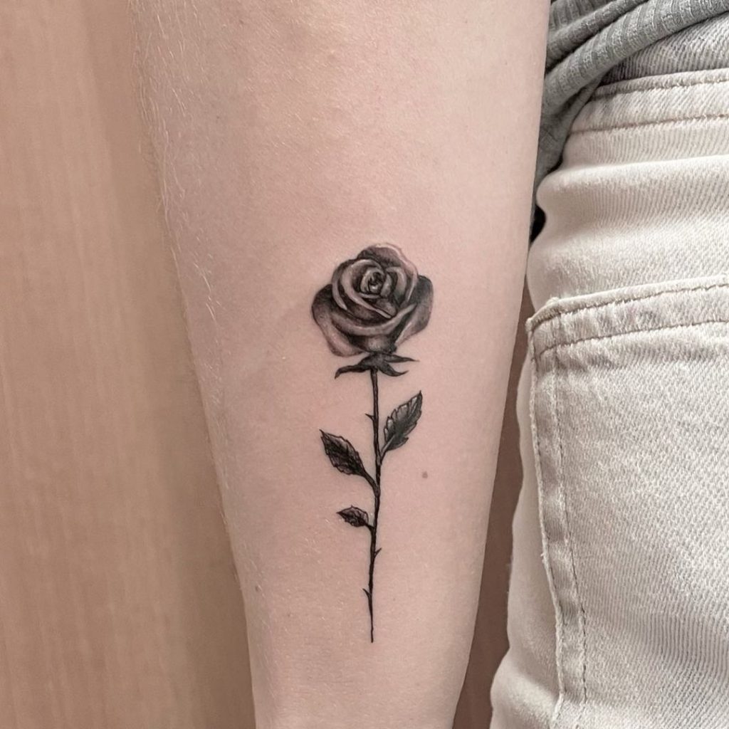 Small Realistic Black and Grey Rose Tattoo by Augusto Fanelli Moneta