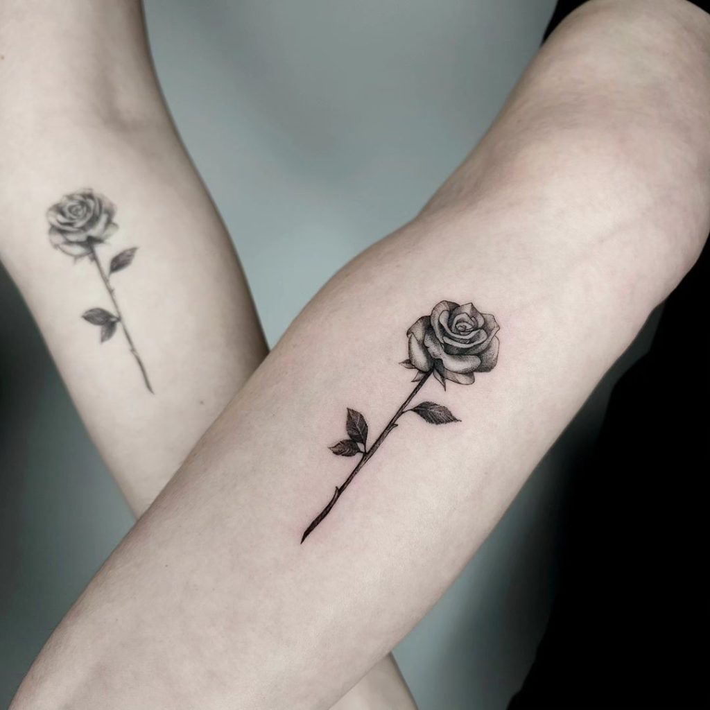 Matching Double Black and Grey Rose Tattoos by Ryan Dobbs 