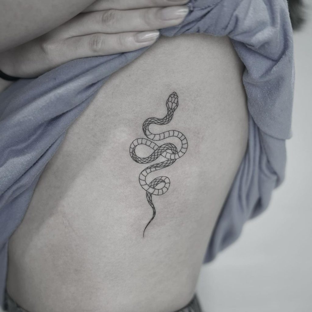 Fineline Snake Rib Tattoo by Eagle