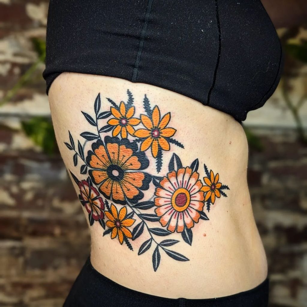 Old School Traditional Side Flower Tattoo by Eli Studer