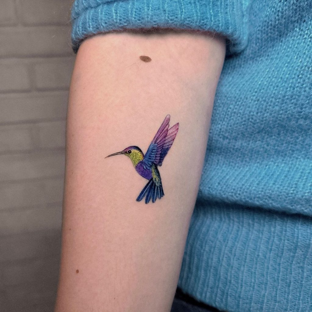 Colorful Small Hummingbird Tattoo by Elvis Sheran Teran