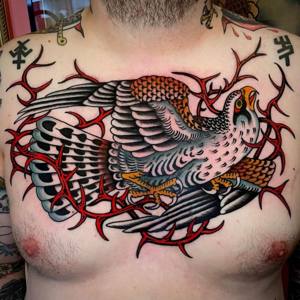 Neotraditional Hawk and Thorns Chest Tattoo by Felix Kienzle
