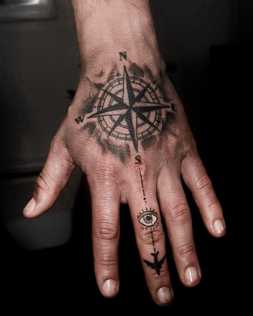 Black and Grey Compass Hand Tattoo by Gustavo Mantilla
