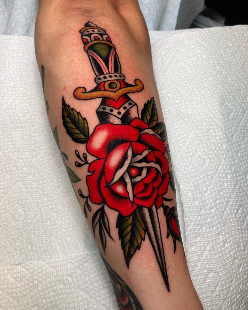 Old School Traditional Rose and Dagger Tattoo by Jesse Smith