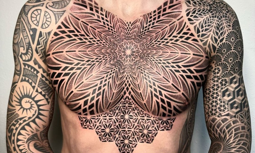 geometric mandala chest tattoo by jakab deszo