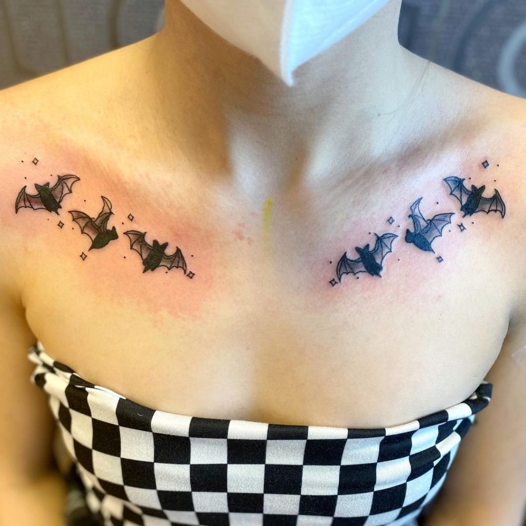 Illustrative Cartoon Bats Collarbone Tattoo by Katie Moon