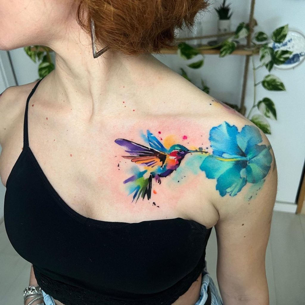Watercolor Hummingbird and Flower Chest and Shoulder Tattoo by Pablo Ortiz