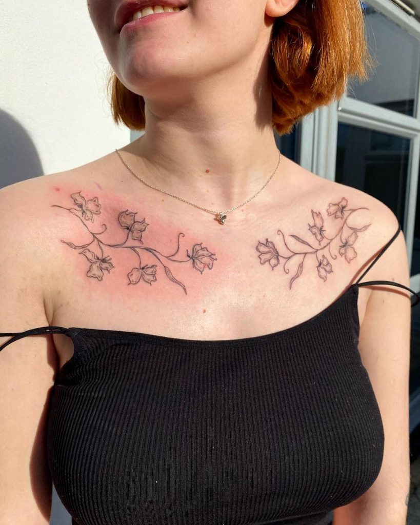 Floral Linework Chest Tattoo by Ella Maddalena