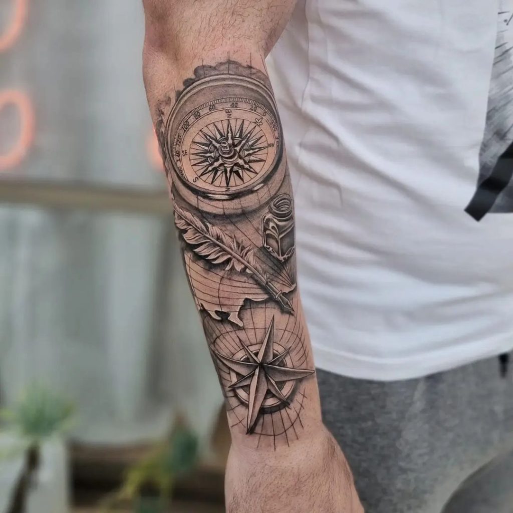 Realistic Map, Quill, Ink and Compass Tattoo by Ralph Huber