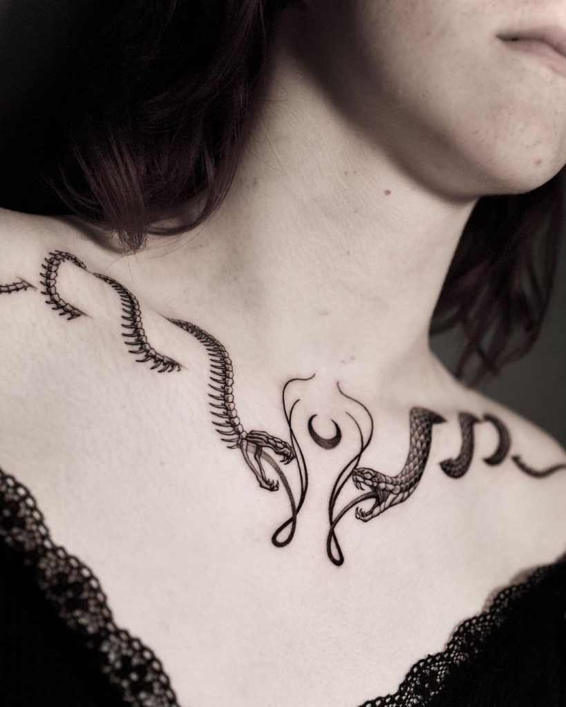 Double Snake and Moon Collarbone Tattoo by Rita Corceiro
