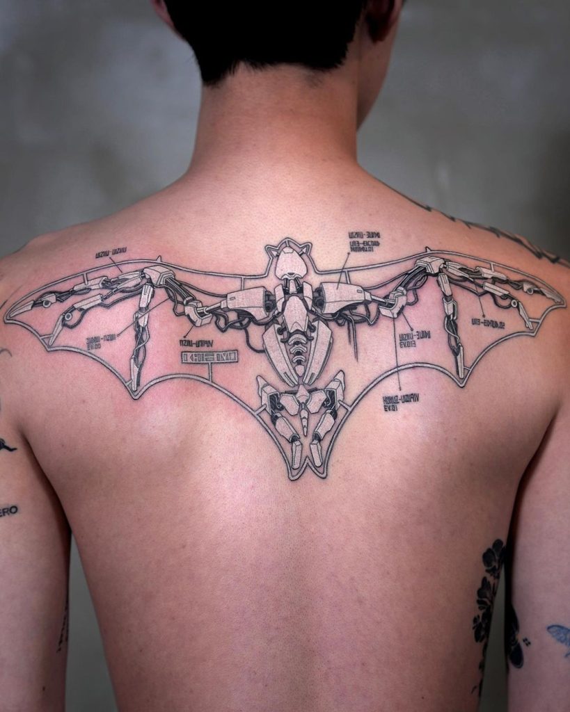 techno wings on the back tattoo by pisatché