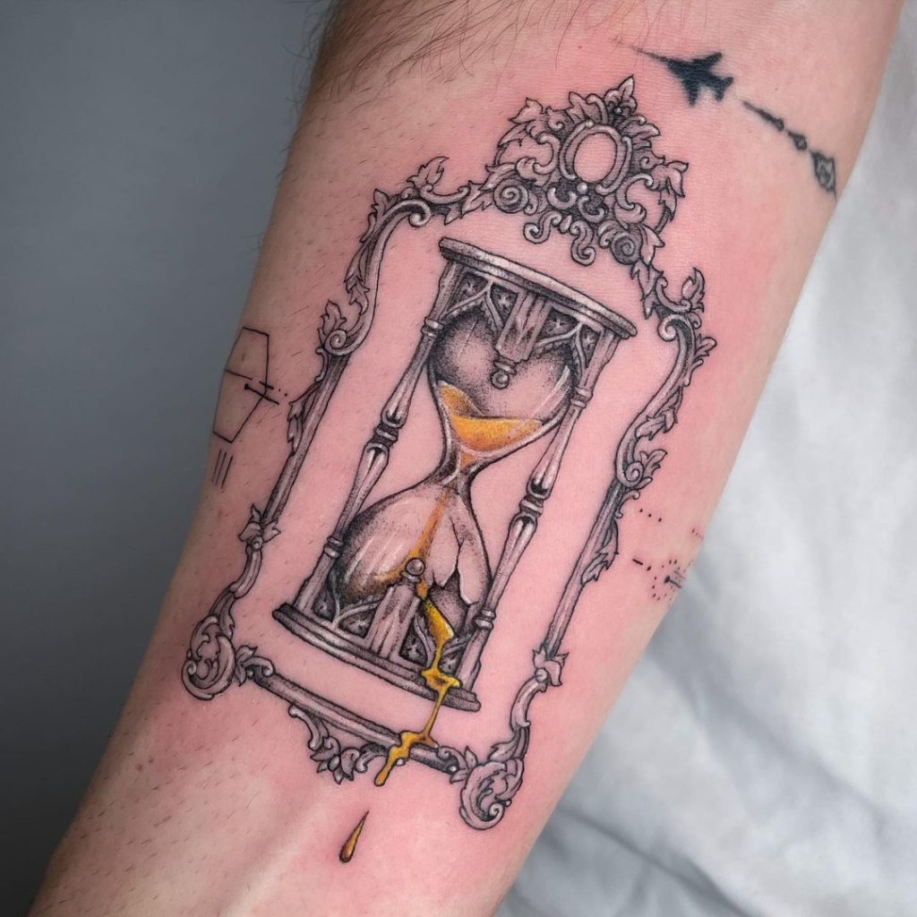 Black, Grey and Gold Hourglass and Frame Tattoo by Diana Kull