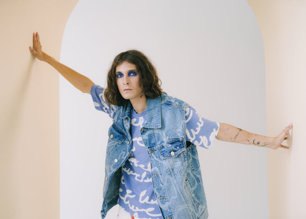 queer person tattooed