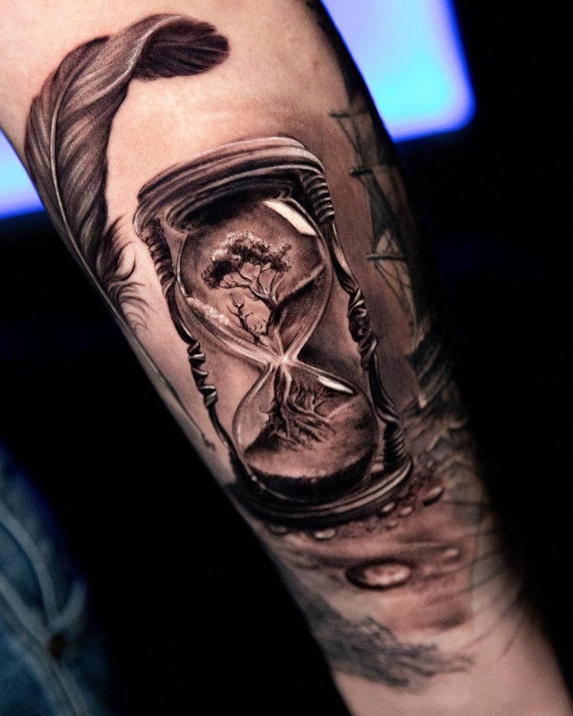 Realistic Black and Grey Hourglass Tattoo by Stefan