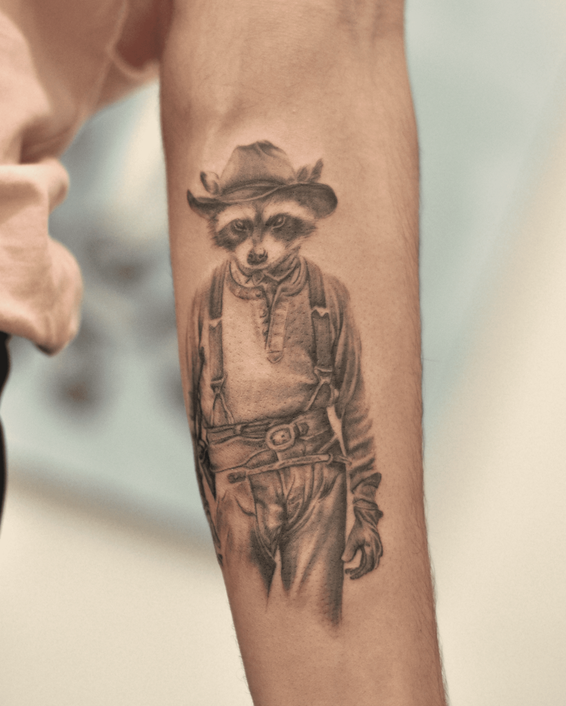 incredible racoon tattoo in far west clothing