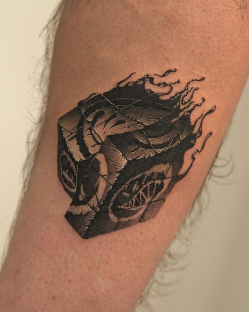 chaos cube tattoo by Yujhi in black & grey style