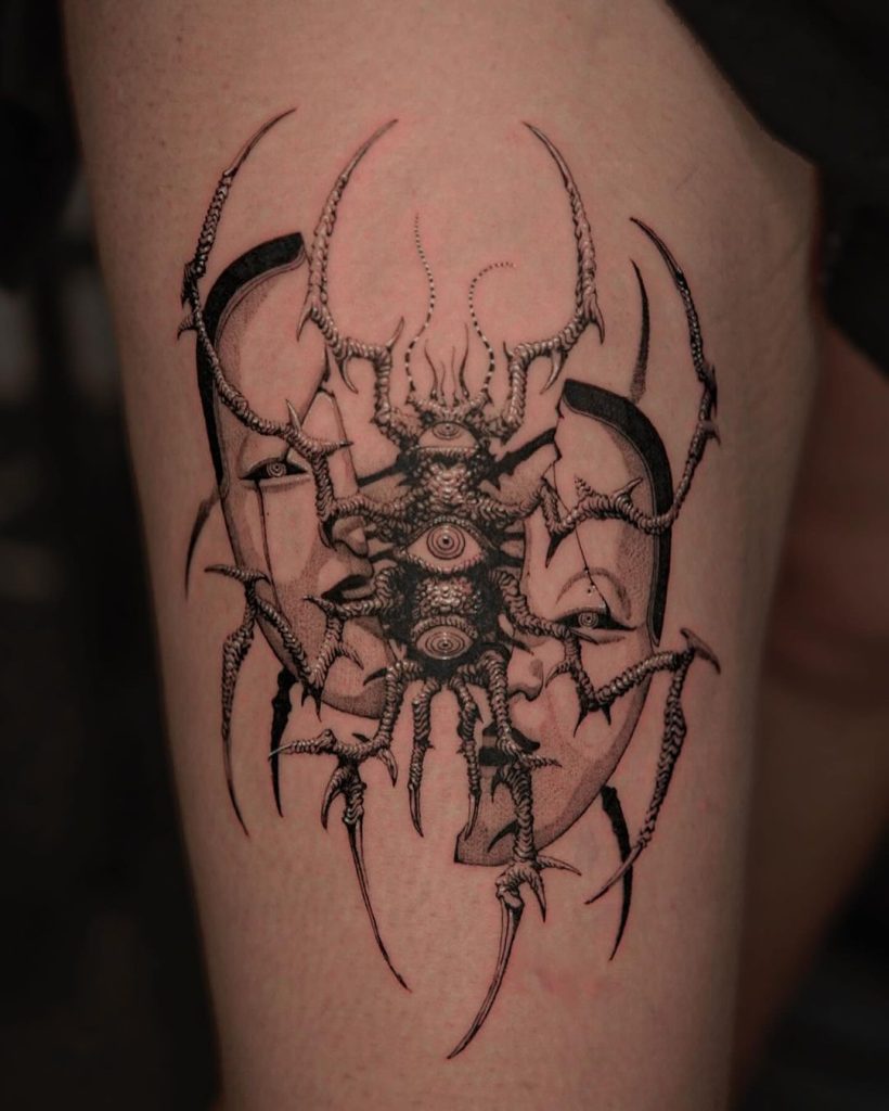 incredible and complex tattoo of mask and monster with eyes by Yujhi in dotwork style