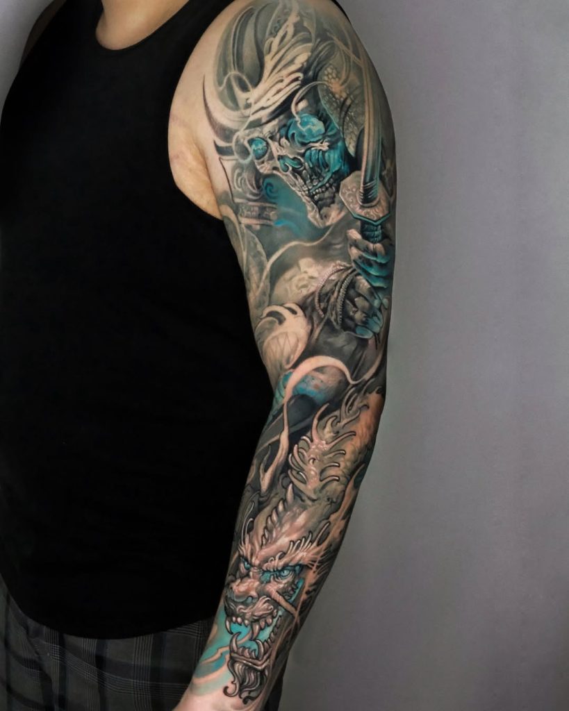 zombie warrior sleeve tattoo with blue highlights