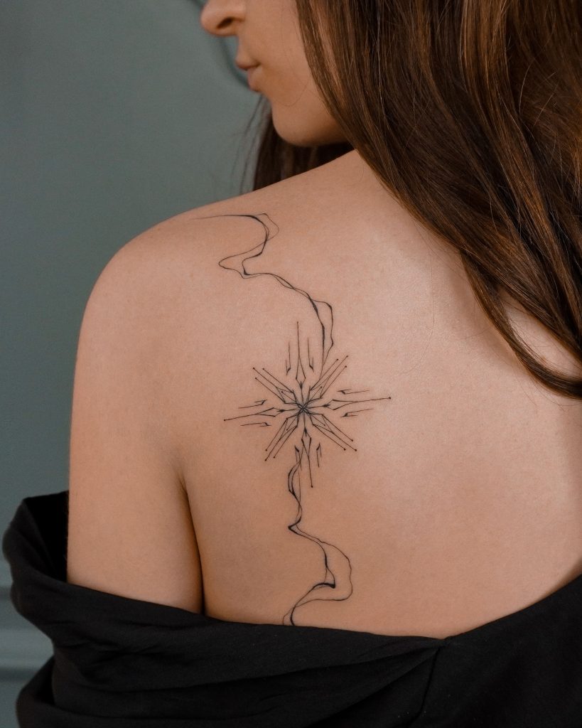 symbolic tattoo in fineline by vitalina bender