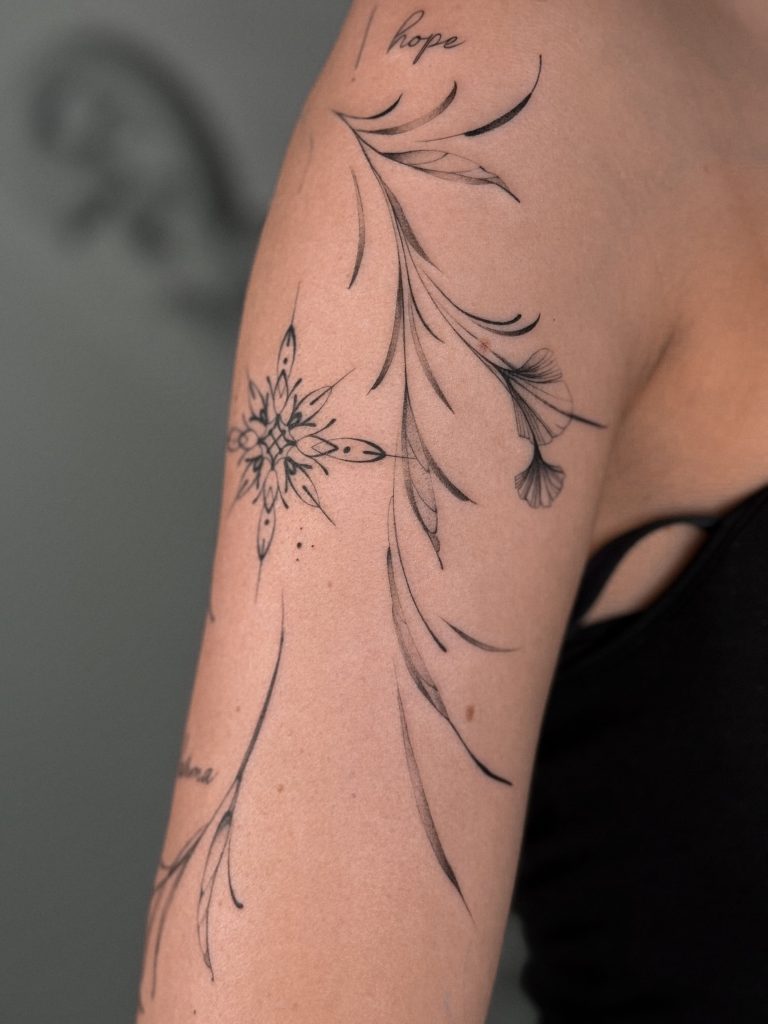 incredible botanical tattoo in fineline and dotwork delicate tattoo by vitalina