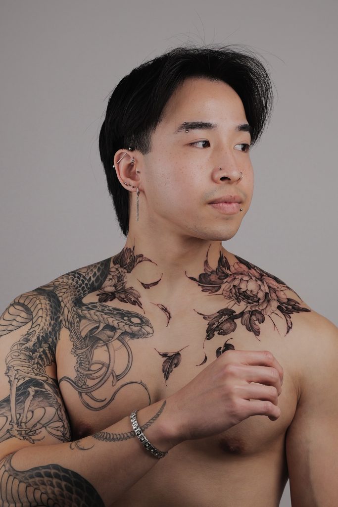 amazing black & grey tattoo on chest by Tamara Shatirishvili tattoo example