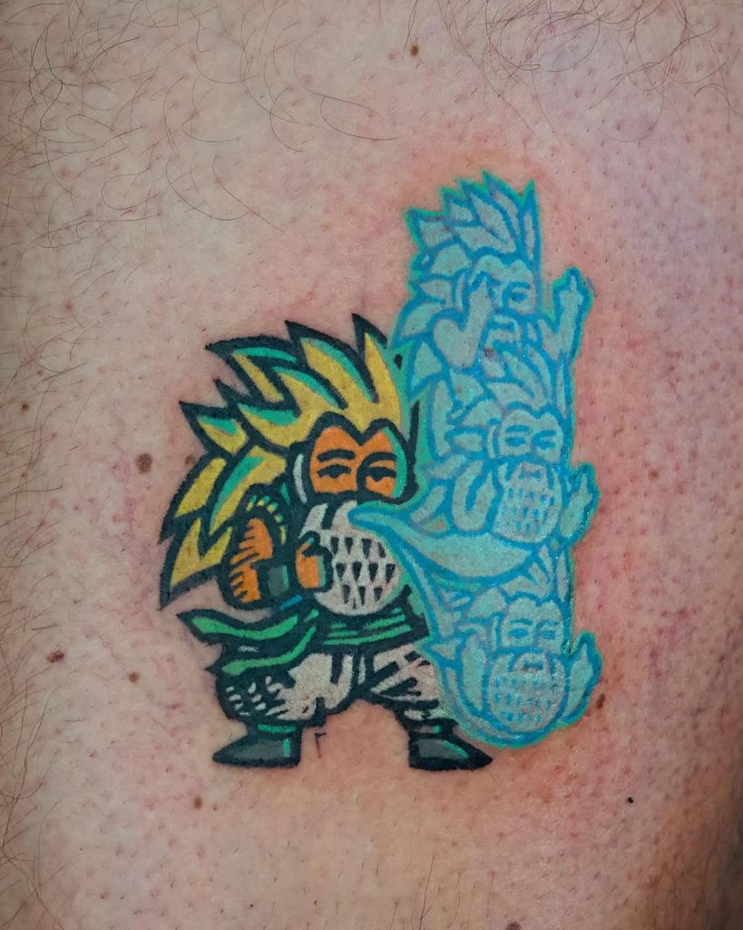 tattoo of gotenks blowing ghosts giving the finger Dragon ball amazing